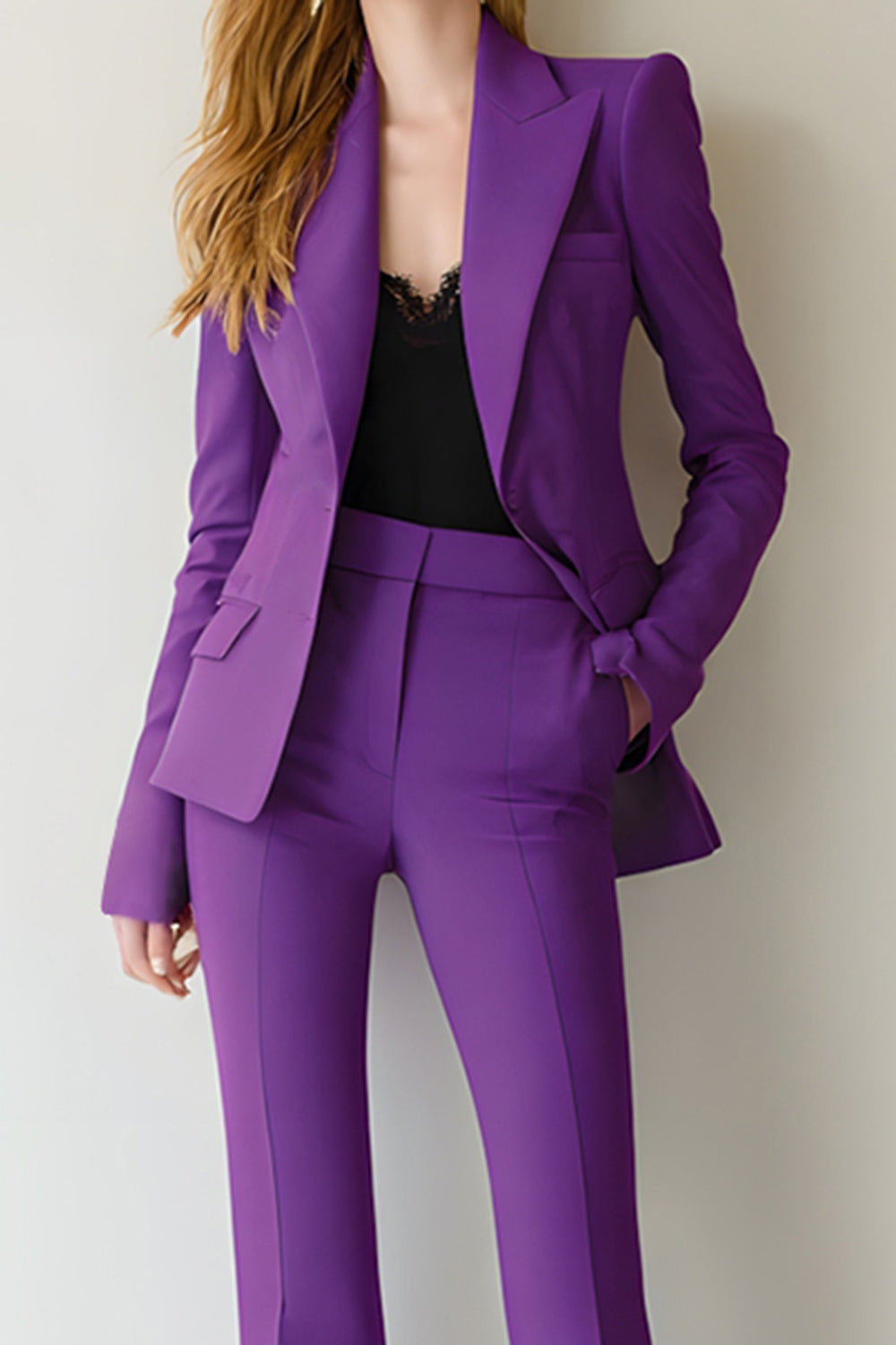 Close-up of purple notch lapel blazer with flap pocket and high-waist flare trouser detail – Una Una